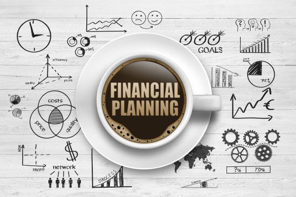 Financial Planning on a map with a coffee cup