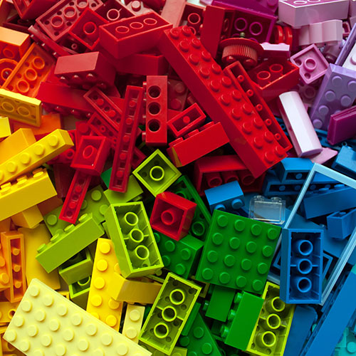 A large pile of assorted colors of Lego blocks.