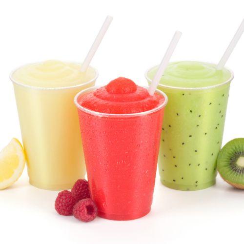 Three fruity frozen drinks - lemon, raspberry, and kiwi.